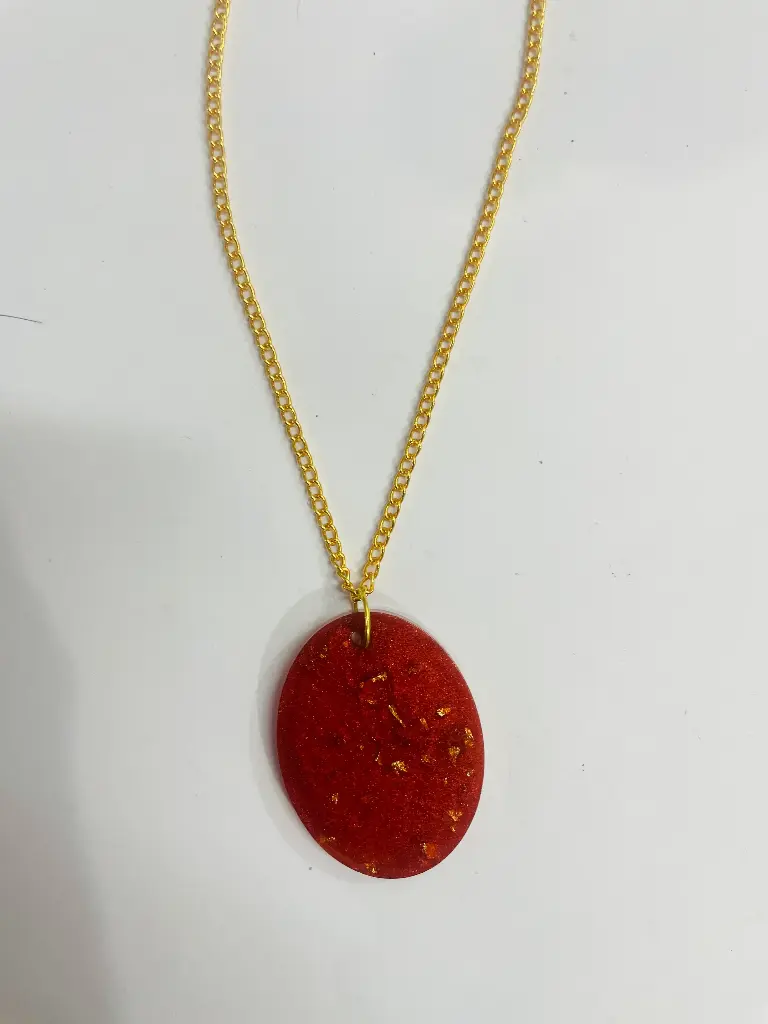 A red with blue and gold Locket -GML048