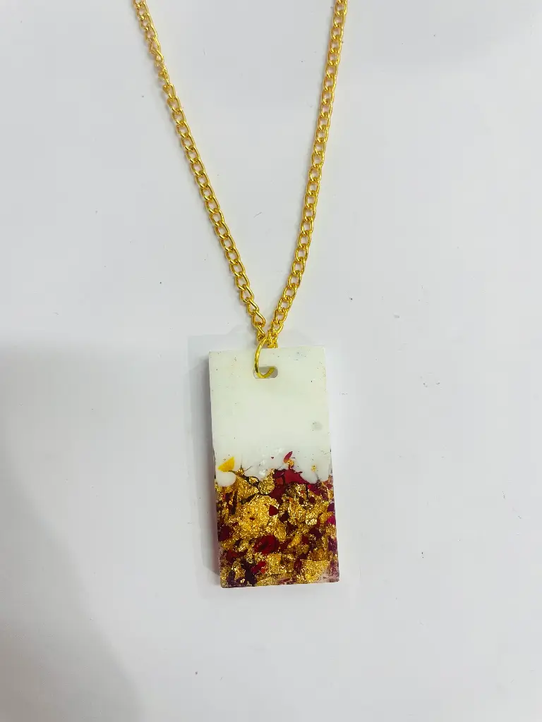 A white with rose petals and gold flakes Locket -GML049