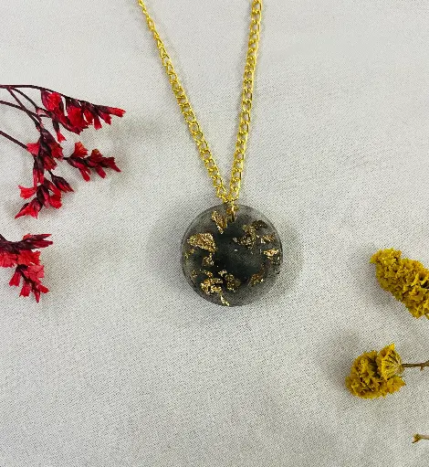 A black with Gold flakes Locket -GML020