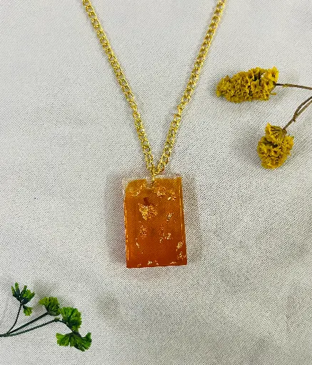 An Orange with gold flakes Locket -GML021