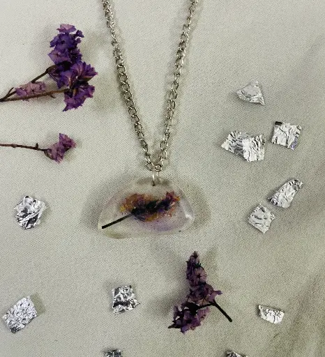 A yellow and purple effect flower Locket -GML029