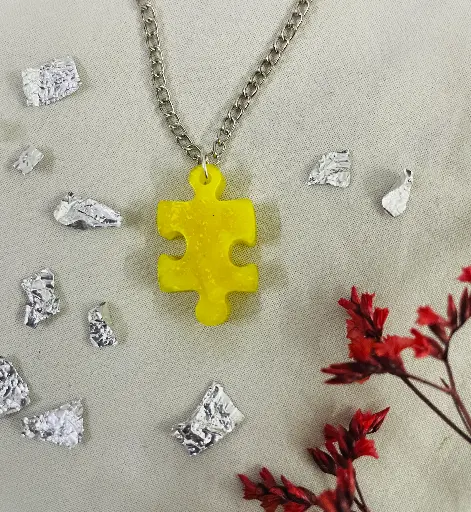 A yellow puzzle Locket -GML032