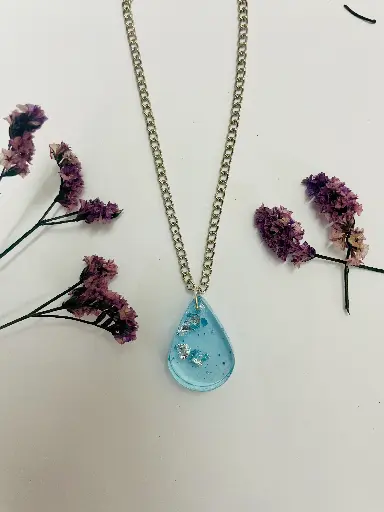 A blue with silver flakes Tear drop Locket -GML035